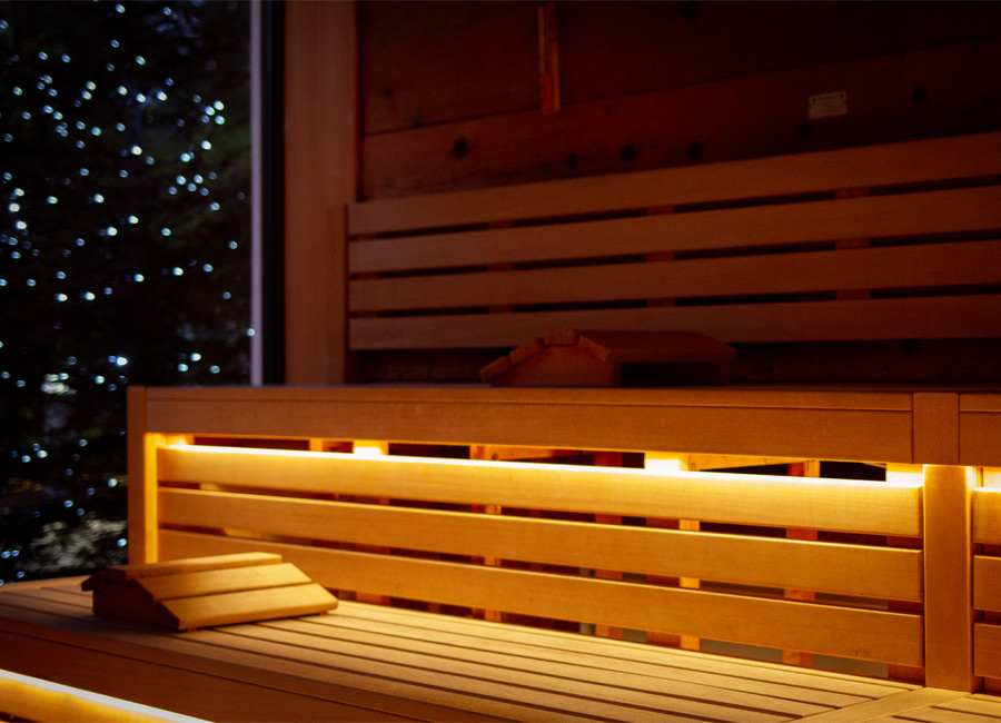 Nordic Sauna lit up by sparkling Christmas lights