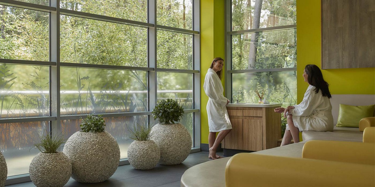 two women in forest relax room 