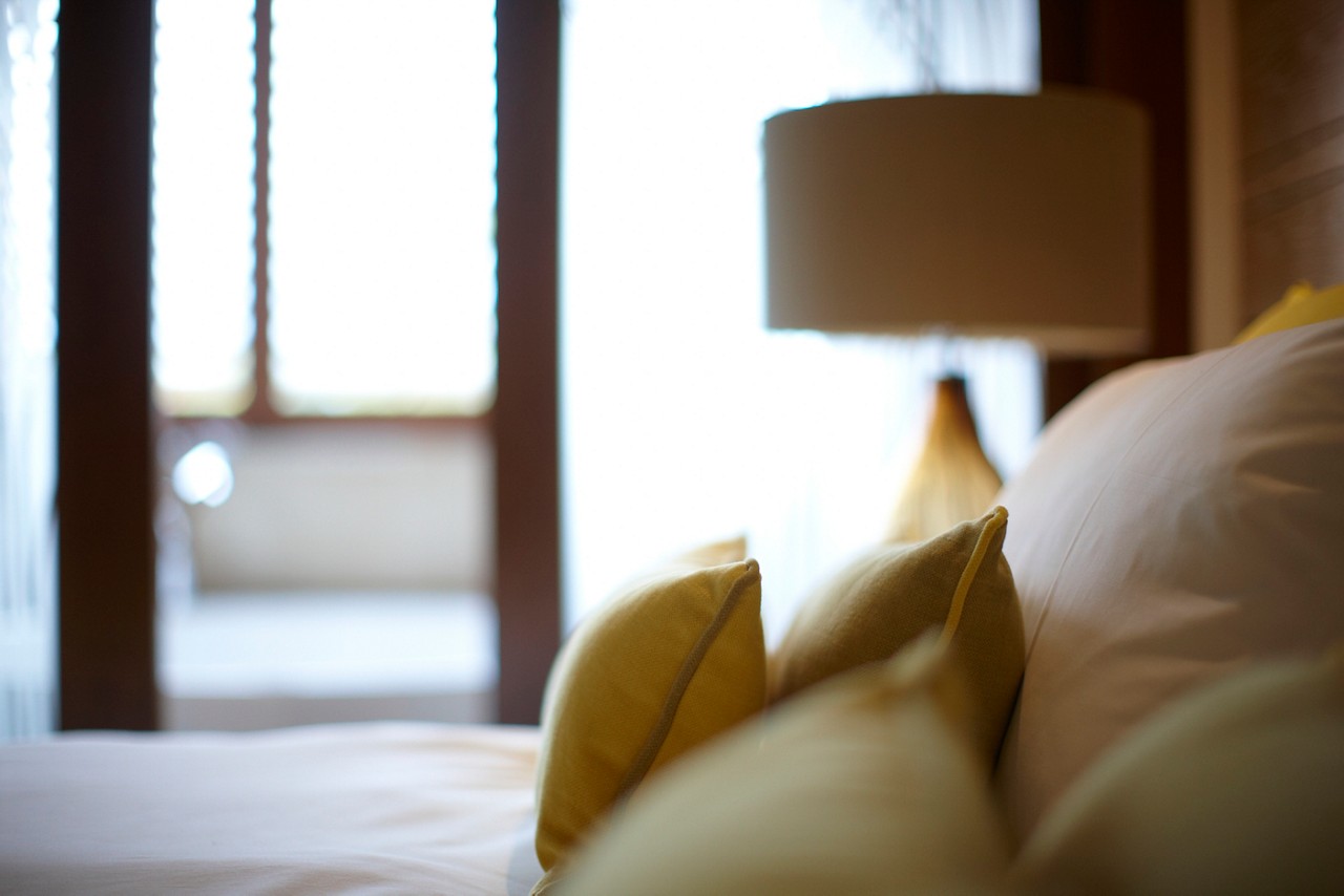 Throw cushions on the Luxury Spa Suite double bed.