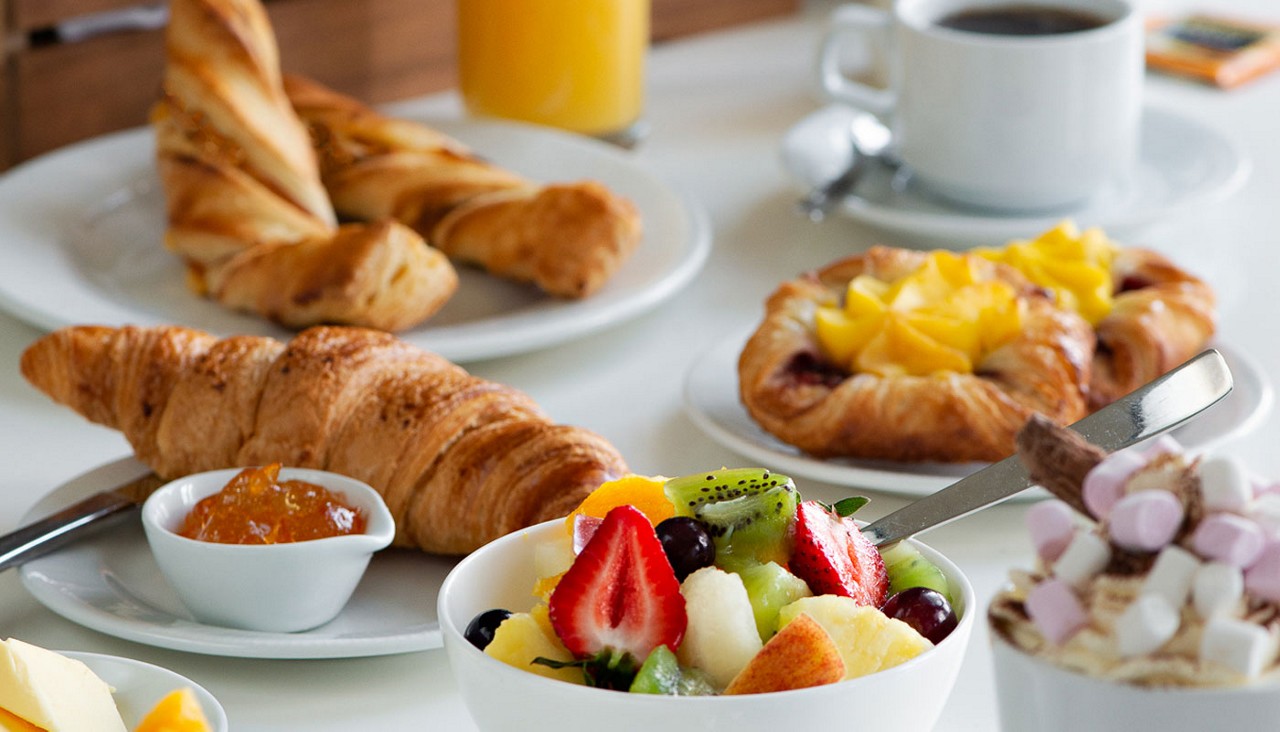 Selection of pastries and beverage options.