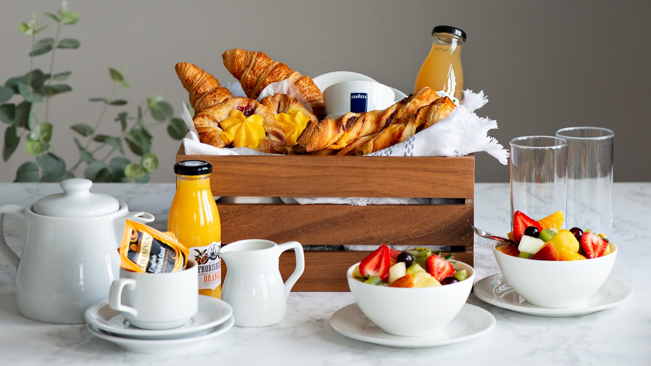 Vitalé Spa Suite breakfast, including pastries, fresh fruit and a selection of beverages.
