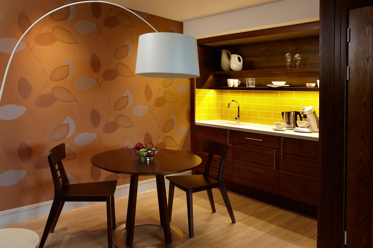 Beverage station and dining area inside Luxury Spa Suite.