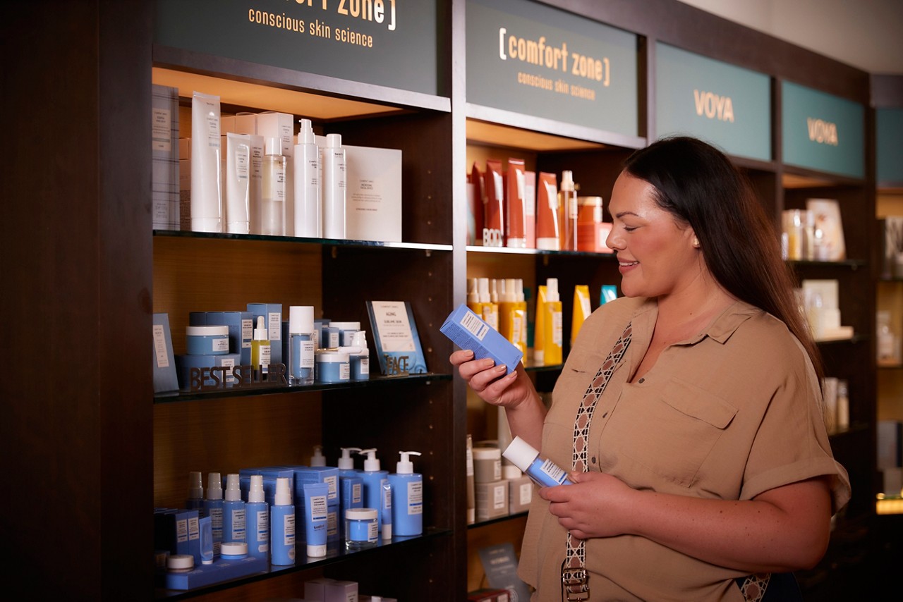 women looking at products inside the Forest Spa Boutique.