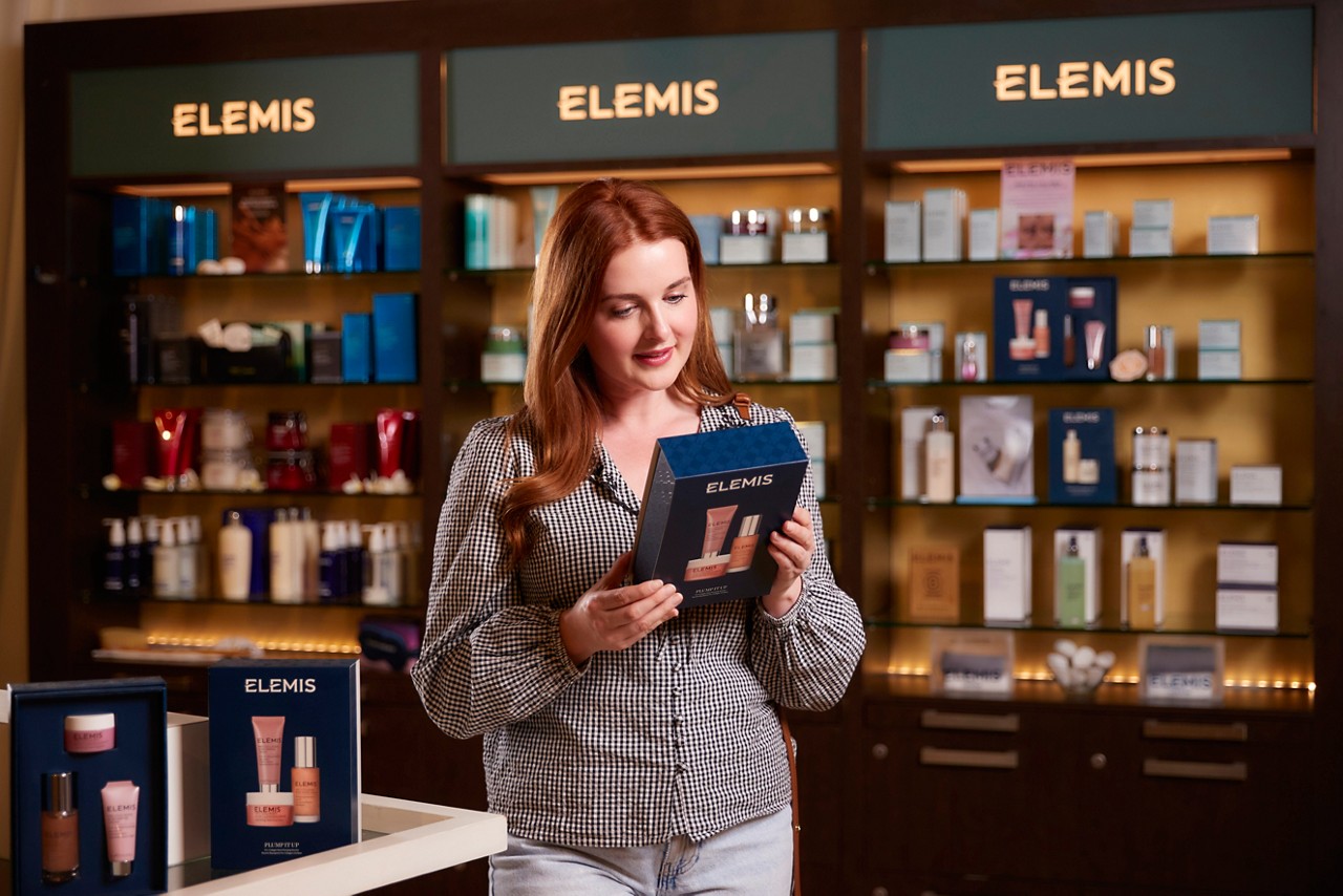 women looking at products inside the Forest Spa Boutique.