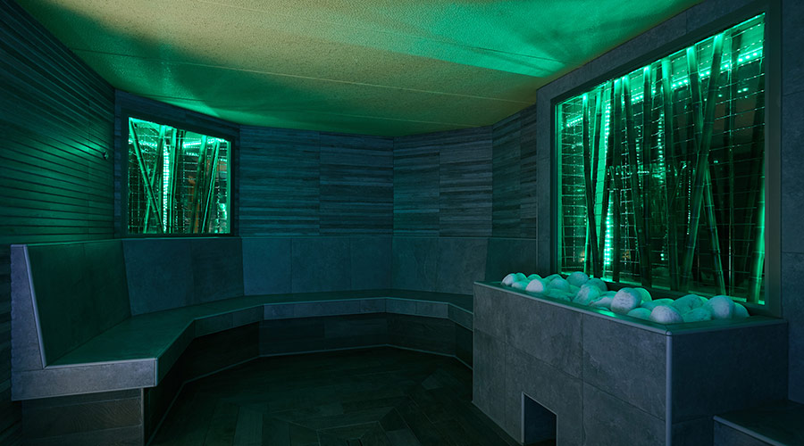 green steam room with bench