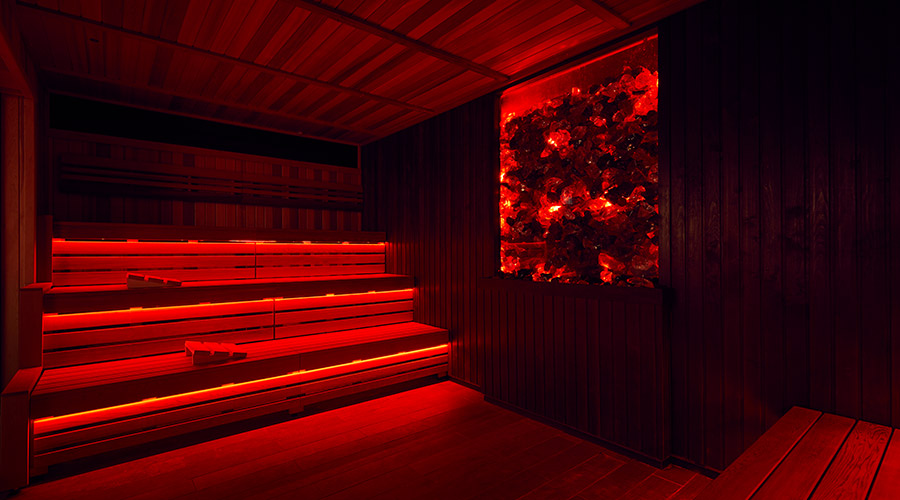 experience room with red lighting and lava walls