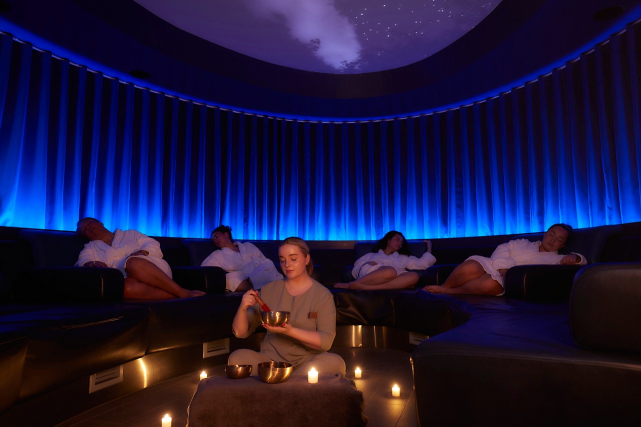 Sound Bathing session with people sleeping as they listen to relaxing tones.