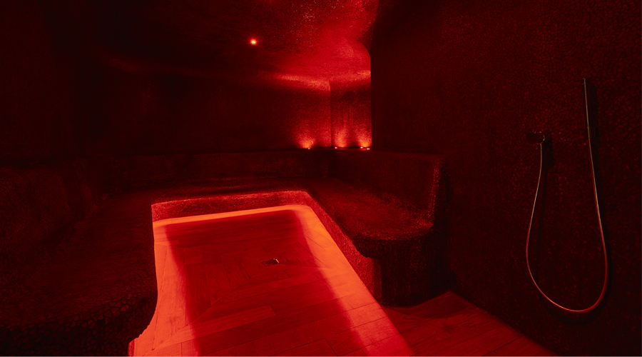 steam room with red lighting