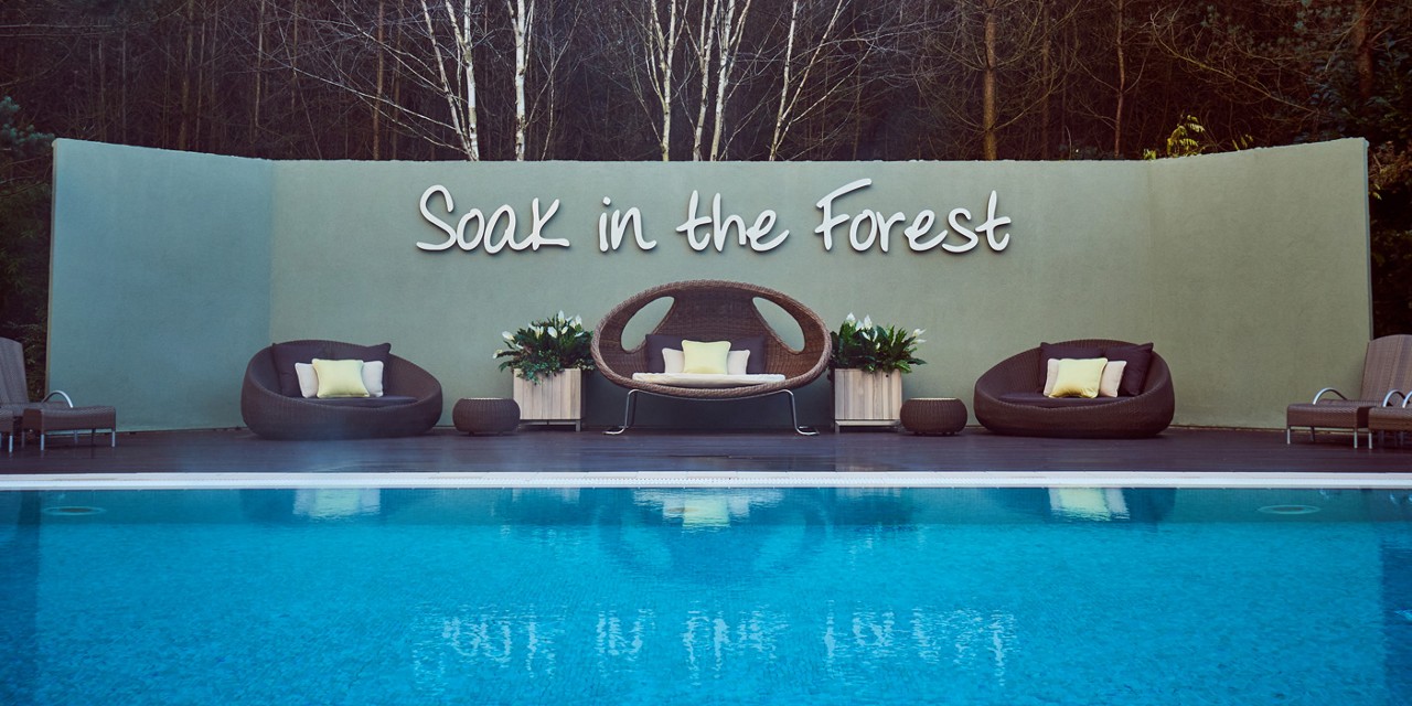 outdoor pool with lounge chairs on terrace