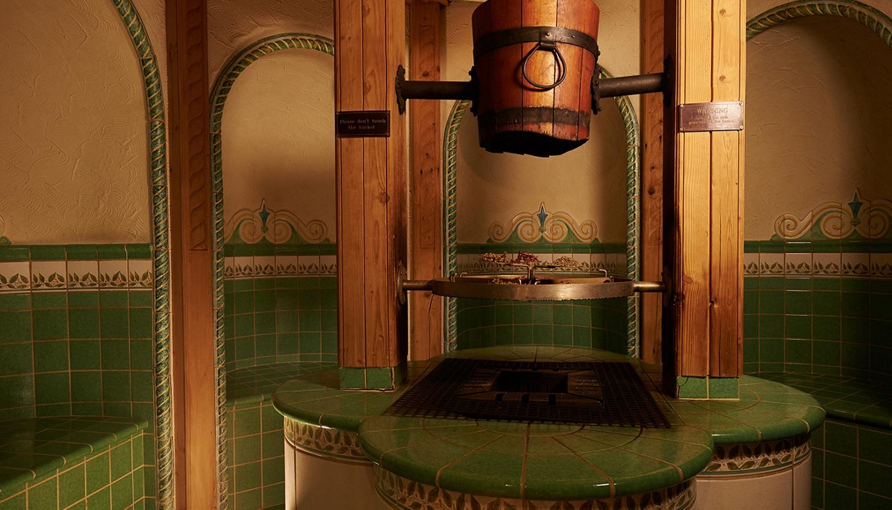 Greeek herbal bath with decorative tiles.