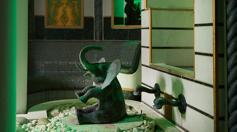 tiled experience room with elephant feature 