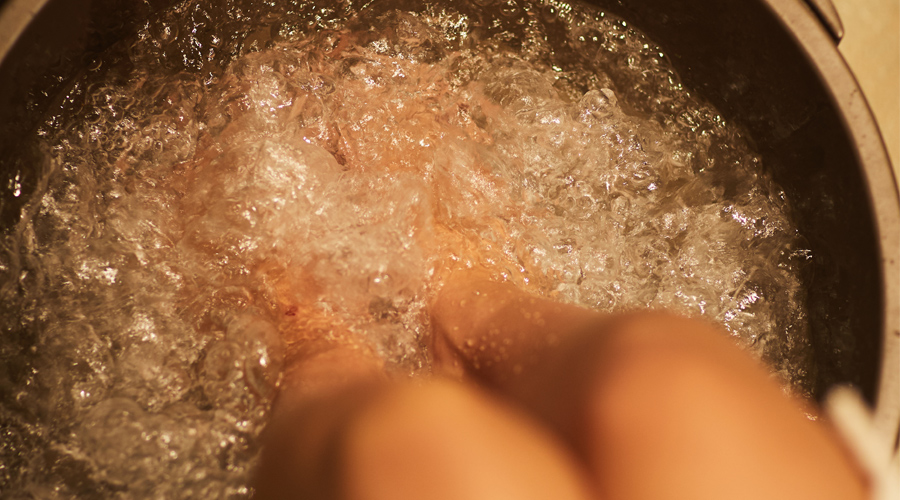close up of feet in bubbles
