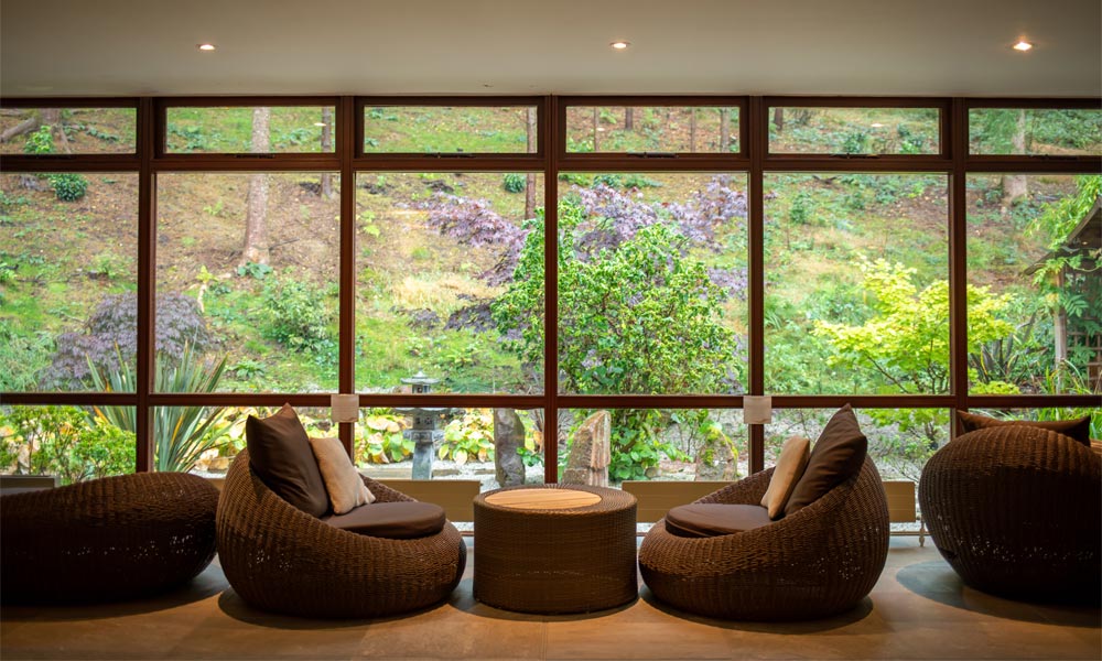 Comfortable lounging chairs looking out to a Zen Garden