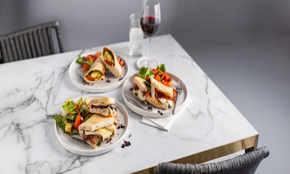 A display of wraps and red wine from Vitale cafe Bar.