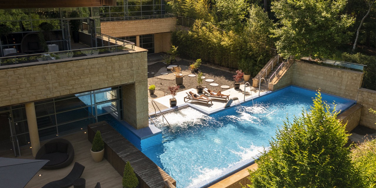 exterior of spa including outdoor pool