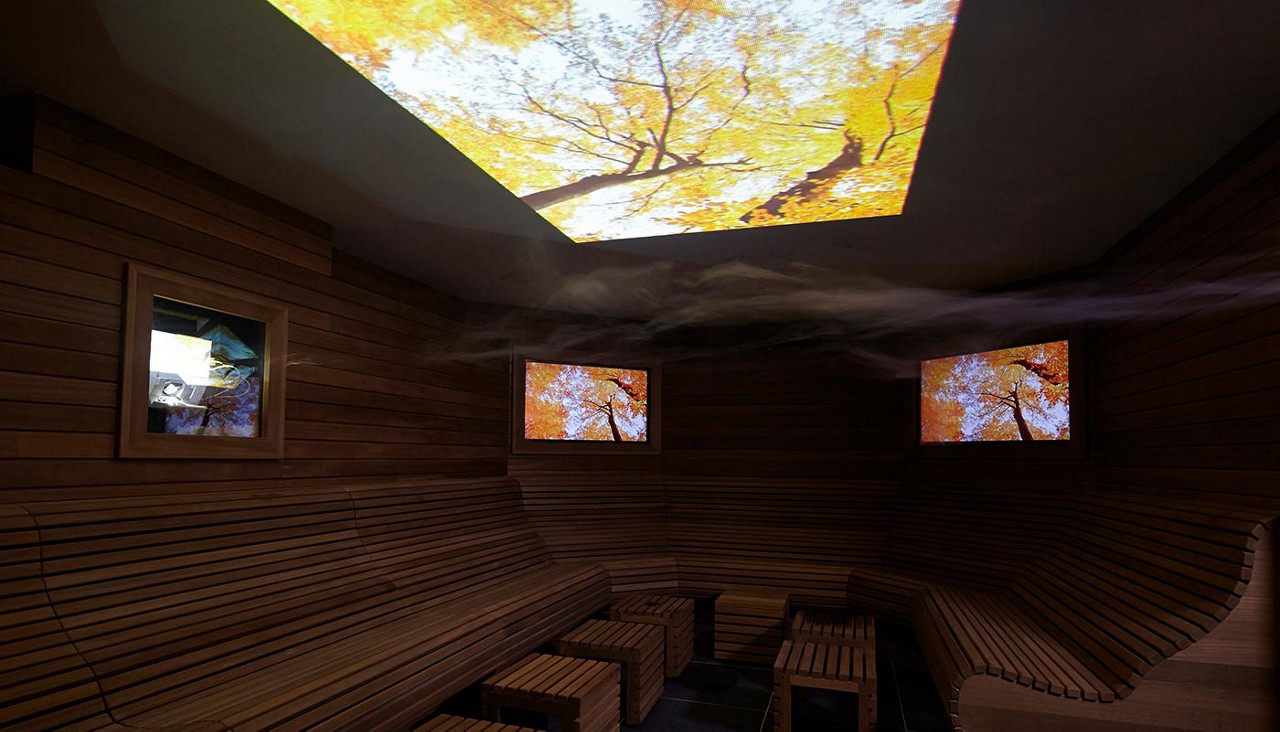 Wooden sensory room with natural imagery.