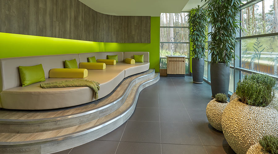 green relax area with large sofa 
