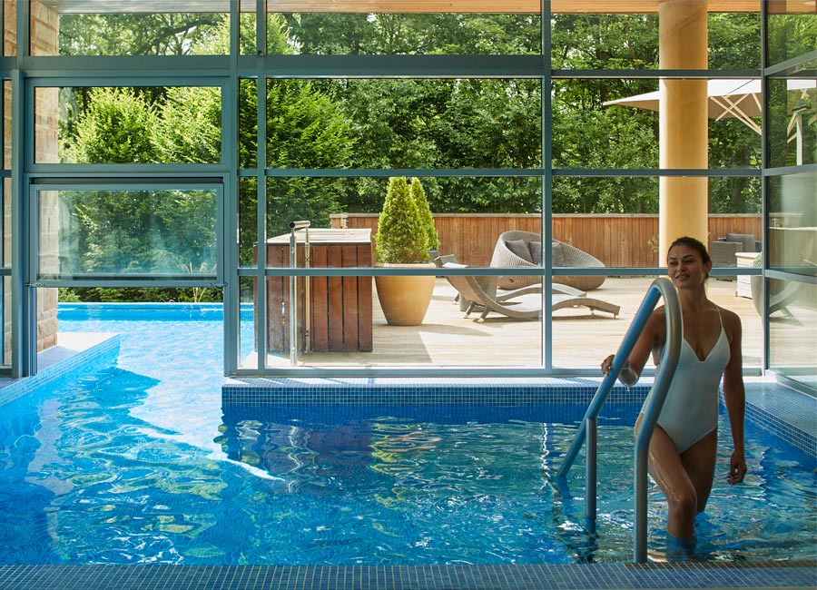 woman walking out the pool