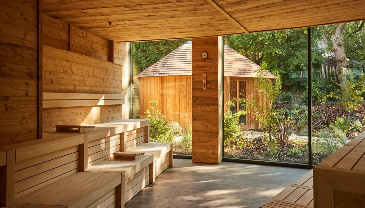 Nordic Sauna with views out to a forest garden.