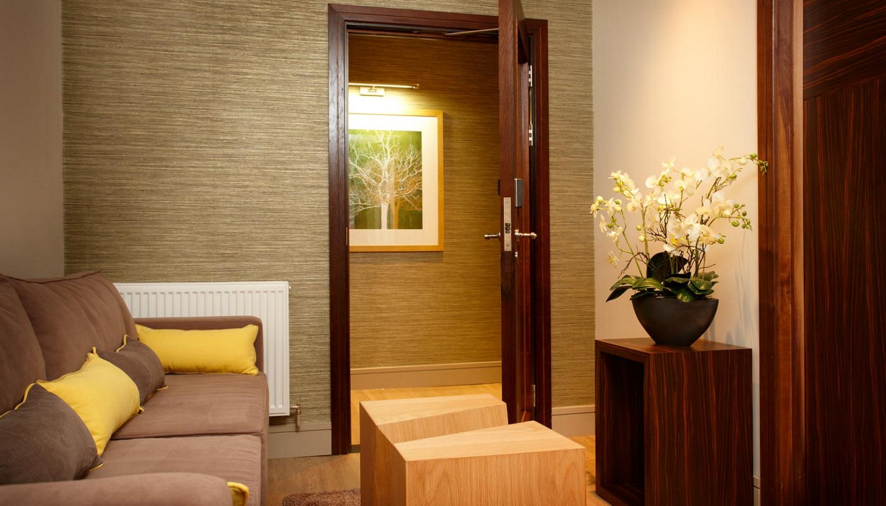 Entrance to the Spa Suite with a comfortable sofa.