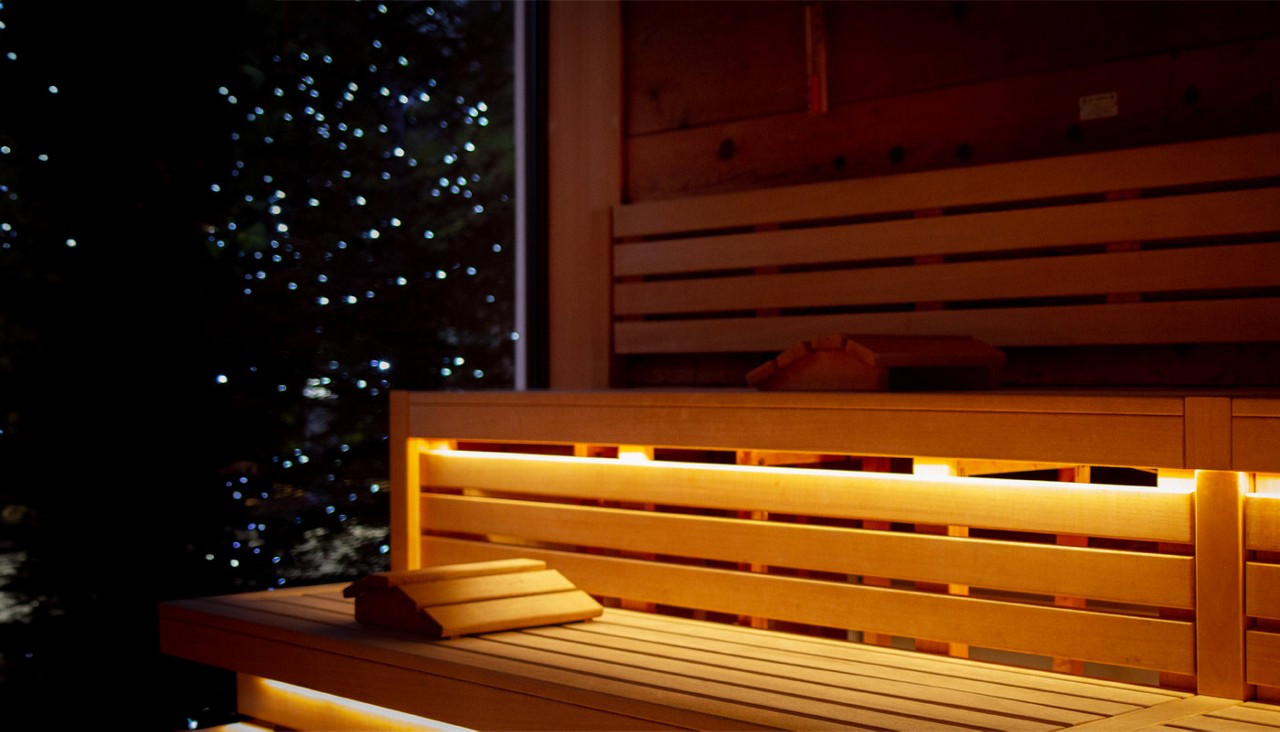 Nordic Sauna lit up by sparkling Christmas lights.