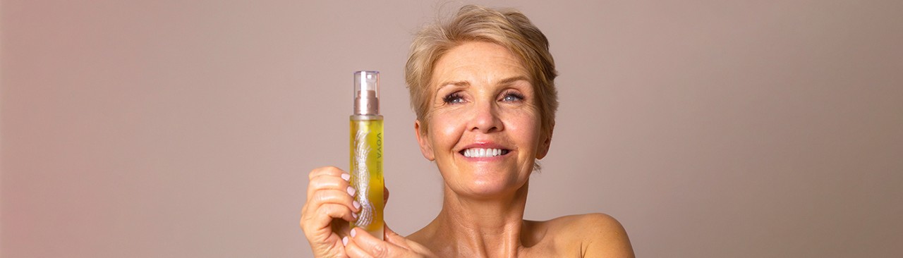 women holding voya product