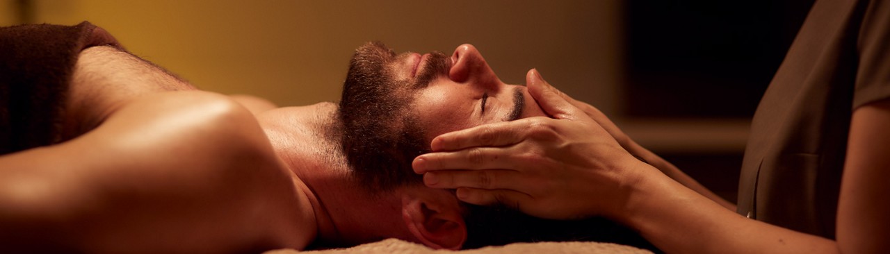 man receiving facial