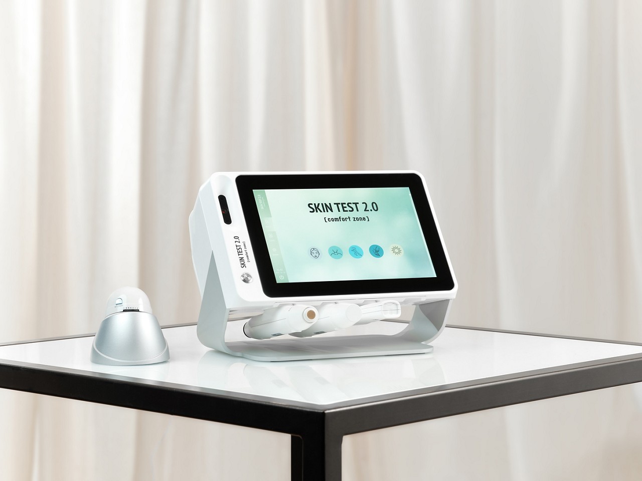 [ comfort zone ] skin analyser machine sitting on a table top.