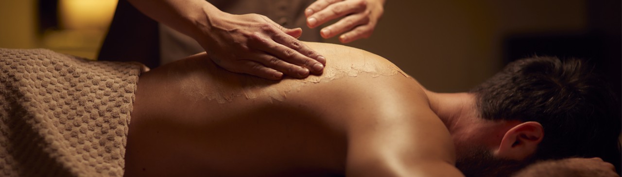 man receiving back massage