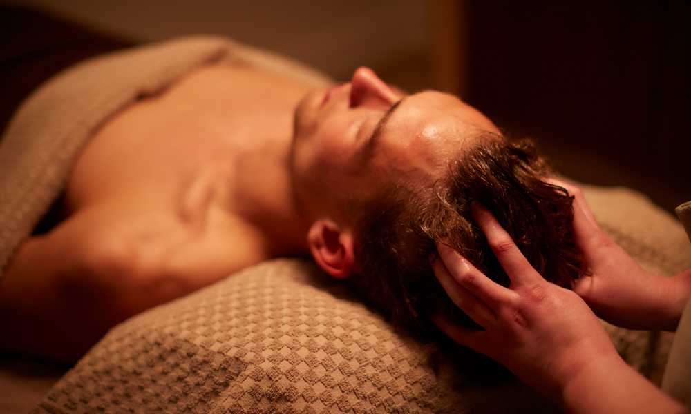 Man having a scalp massage.