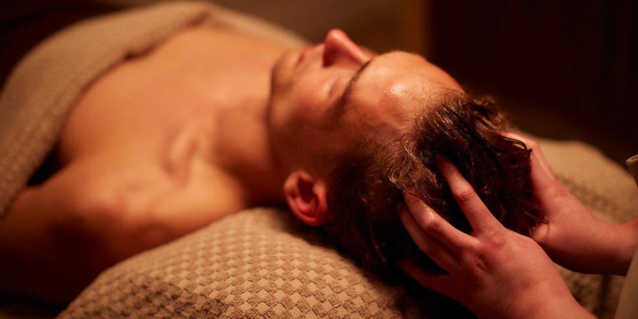 Man having a scalp massage.