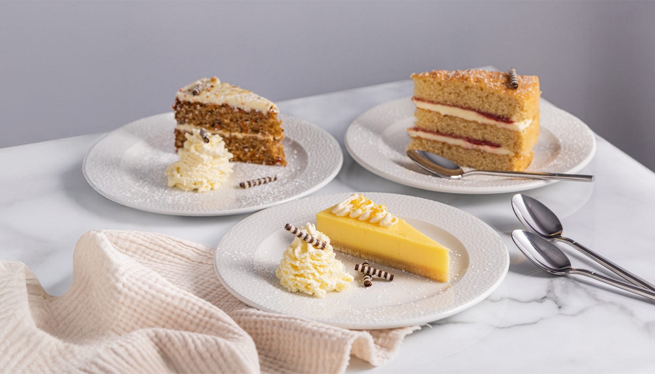 Cakes and tarts served with fresh cream.